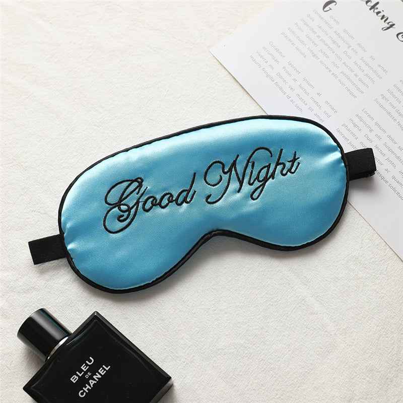 Silk eye mask in blue with black piping and Good Night embroidery