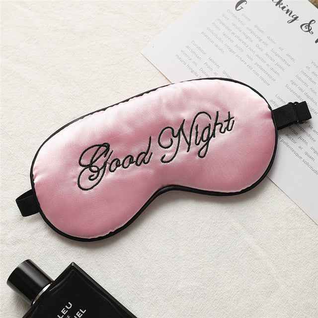Silk eye mask in pink with black trim and Good Night embroidery, adjustable strap