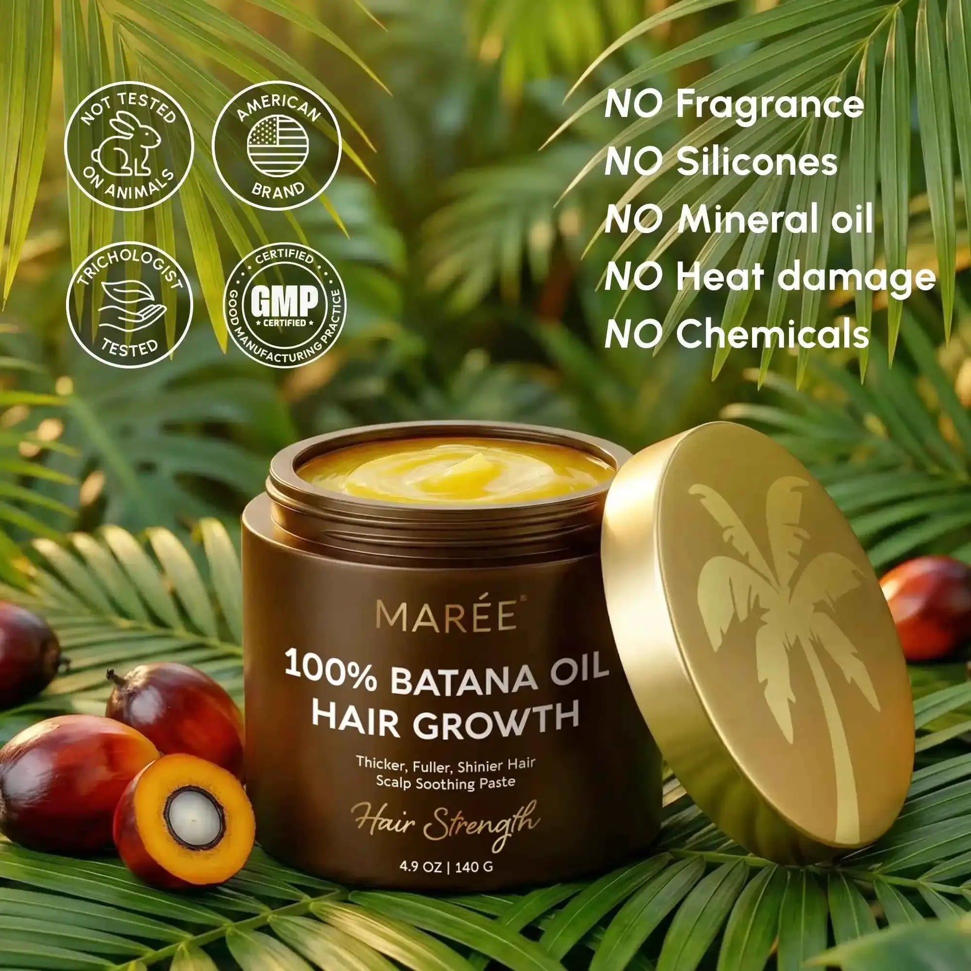 Marée Batana Hair Growth Paste by RadiantRoots in a brown jar with a gold lid, surrounded by tropical leaves.