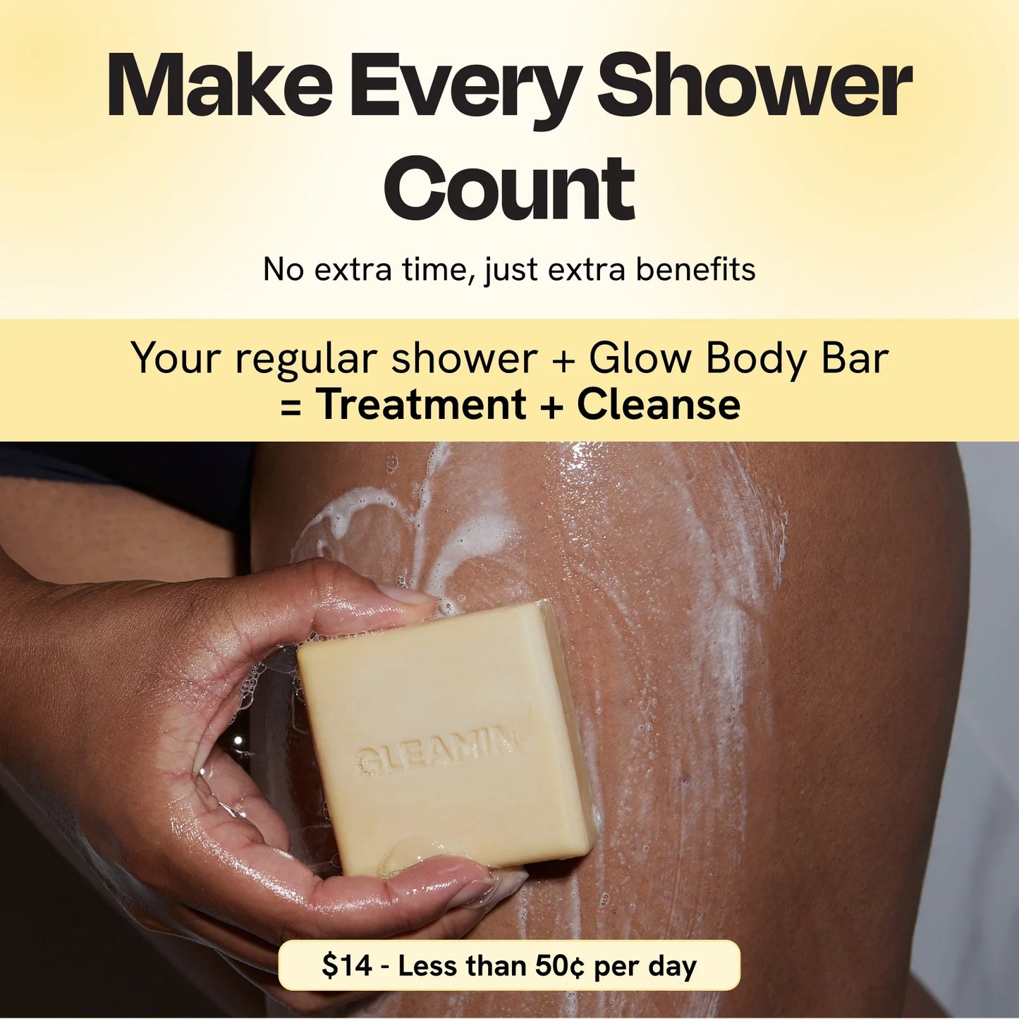 Glow Body Bar by Gleamin, pale yellow brightening bar soap being lathered on skin