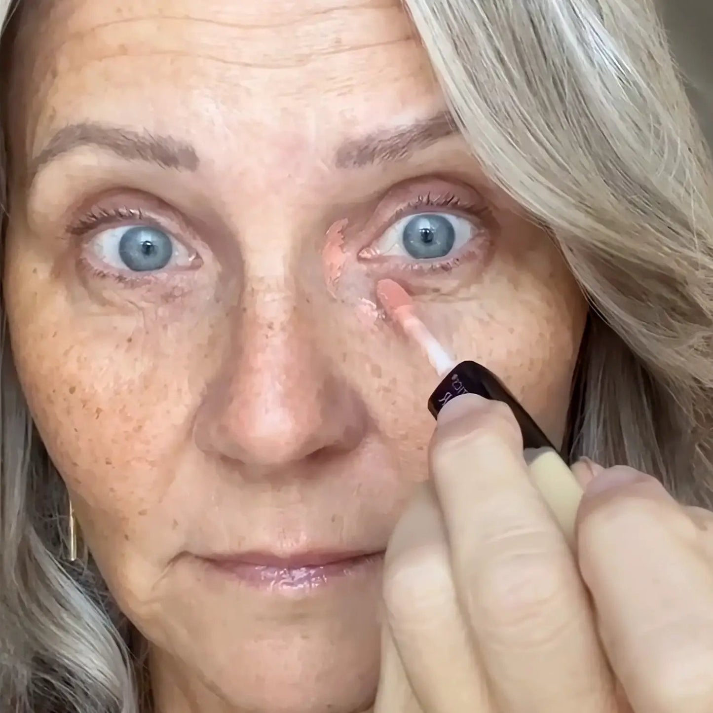 AmazingCosmetics Color Correctors concealer being applied under the eye