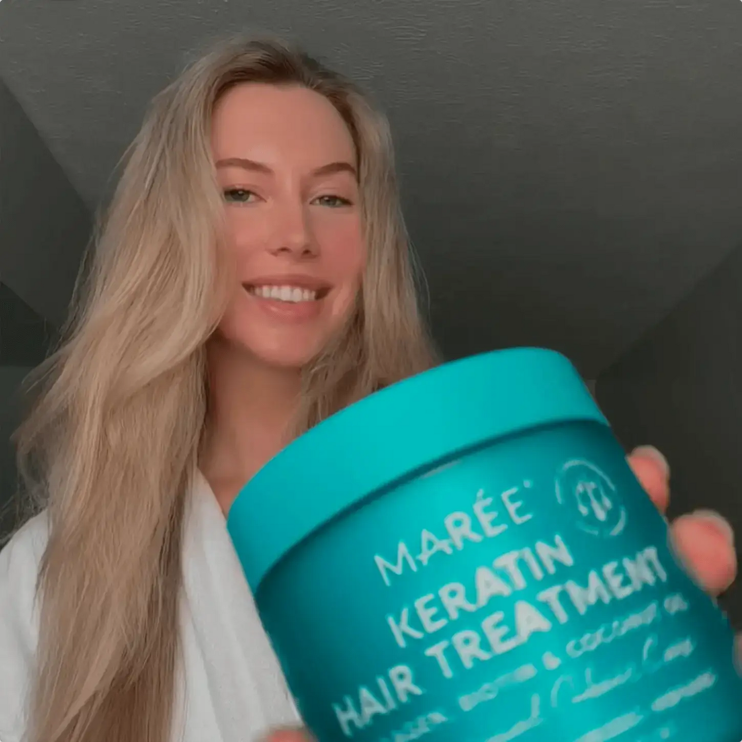 Keratin Hair Treatment by RadiantRoots in a turquoise jar