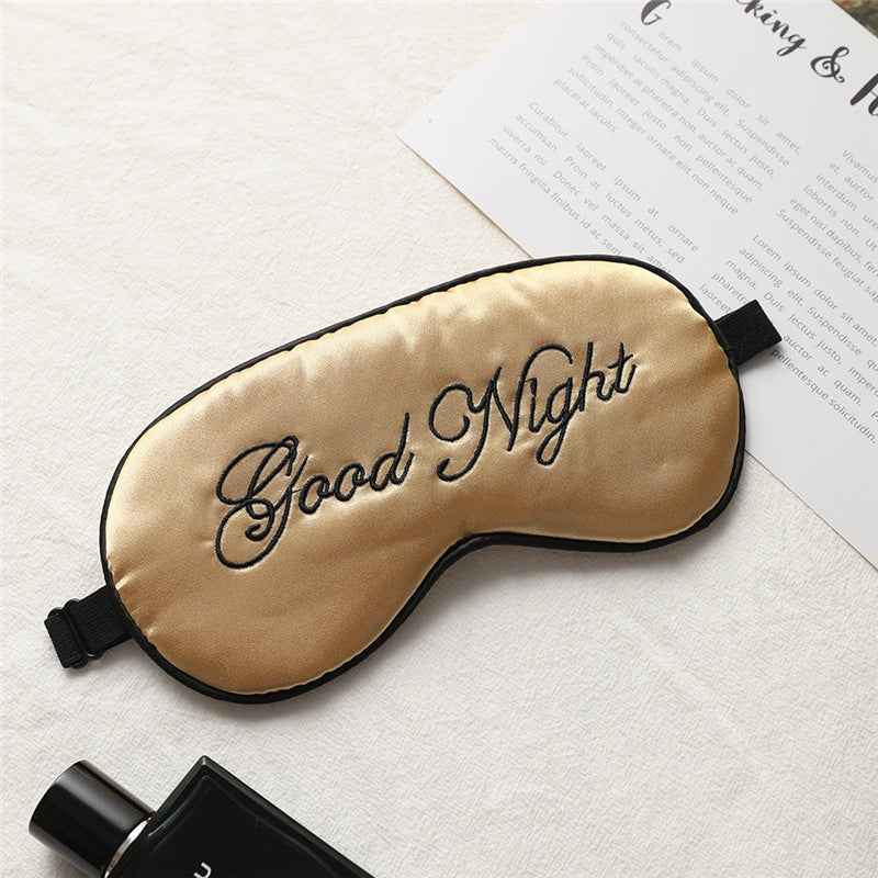 Luxurious Embroidered Silk Eye Mask in gold satin with black trim and Good Night embroidery